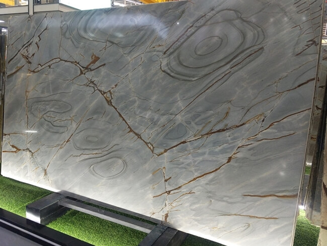Blue Roma Quartzite slab with gold and brown veins