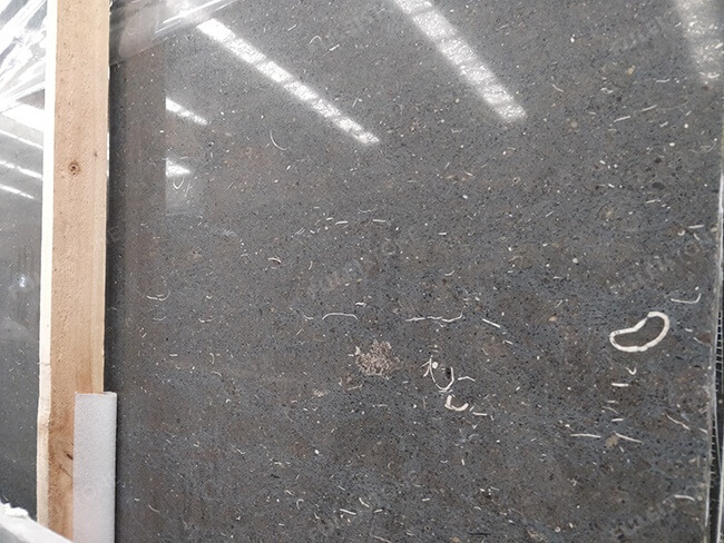 close up of honed black limestone slabs (3)