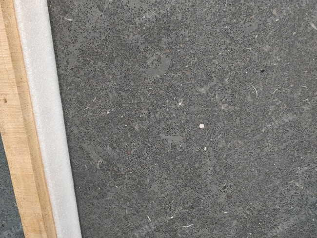 close up of honed black limestone slabs (4)